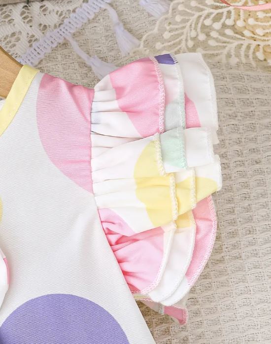 Vestido de Verano Adorable para Niñas con Mangas de Volantes y Detalle de Lazo - Estampado de Lunares Pastel